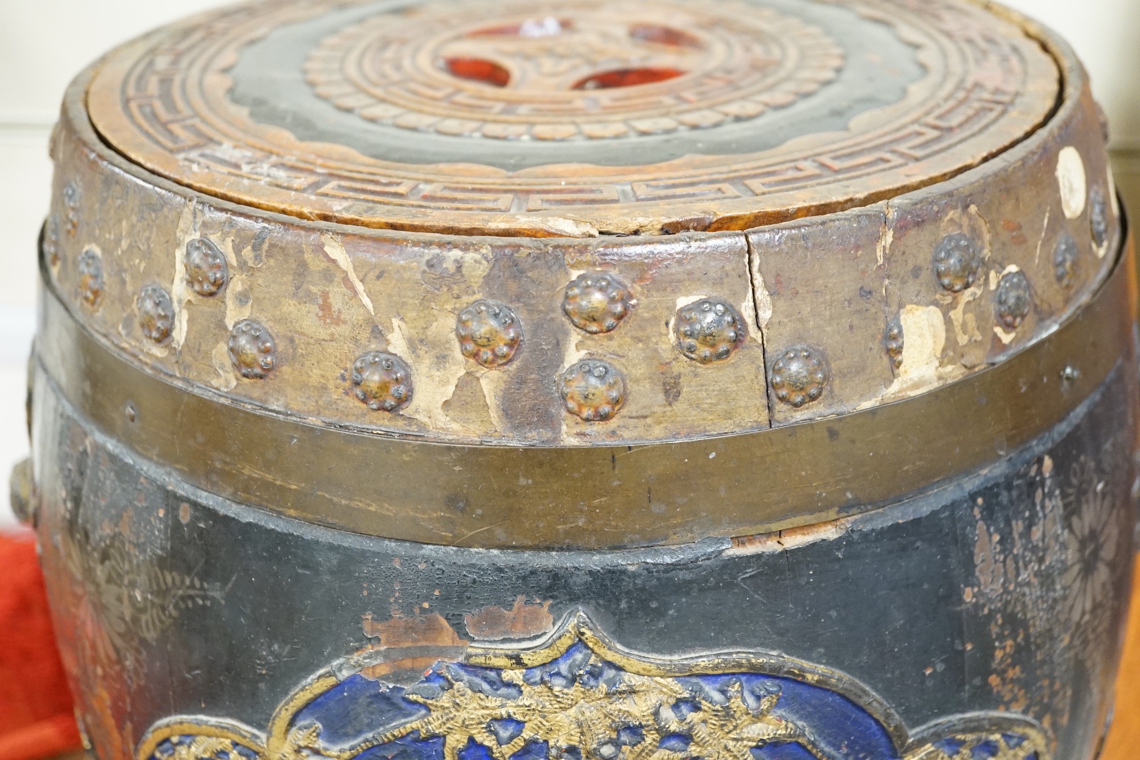 A Chinese lacquer decorated wood barrel form seat/storage container, 40cms high